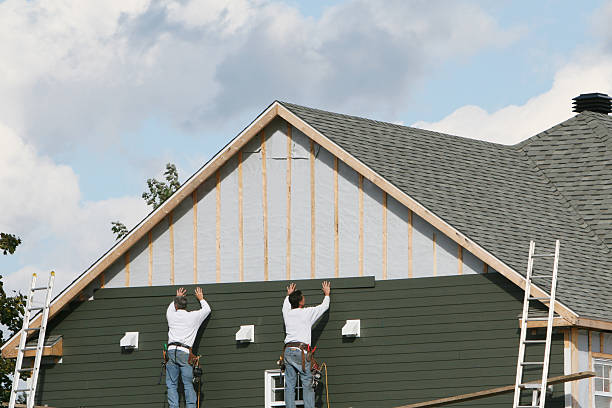 Professional Siding Contractor technician working in Ellwood City, PA